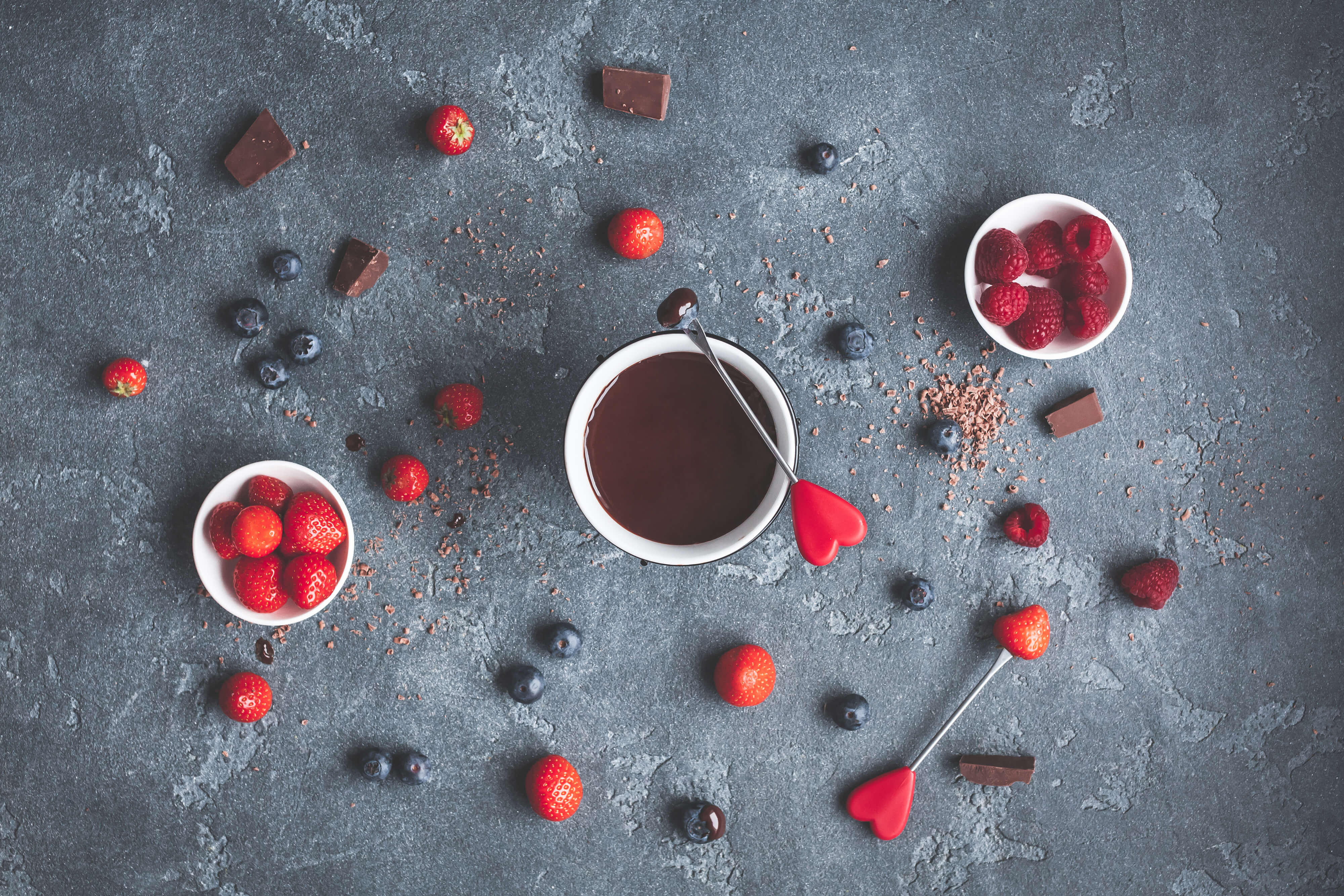 bowls of berries and hearts