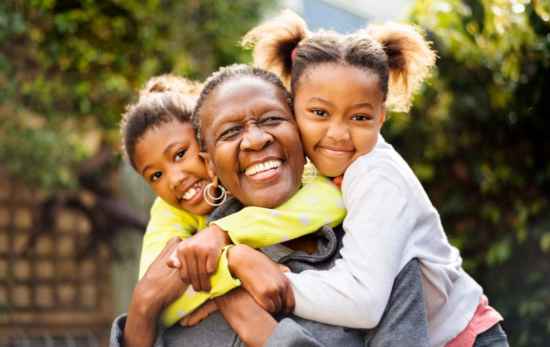 smiling woman with children