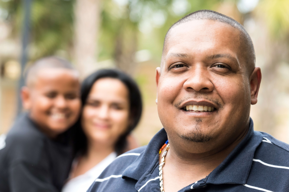 Man with Family Smiling