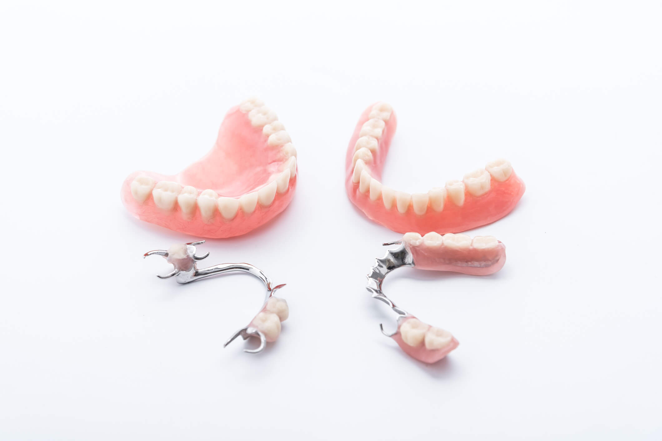 photo of full set dentures and partial dentures