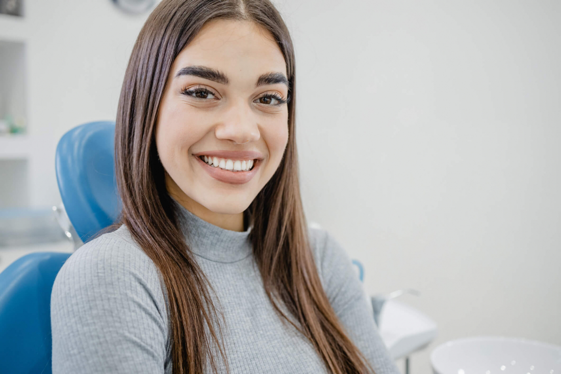 woman smiling in dental chair